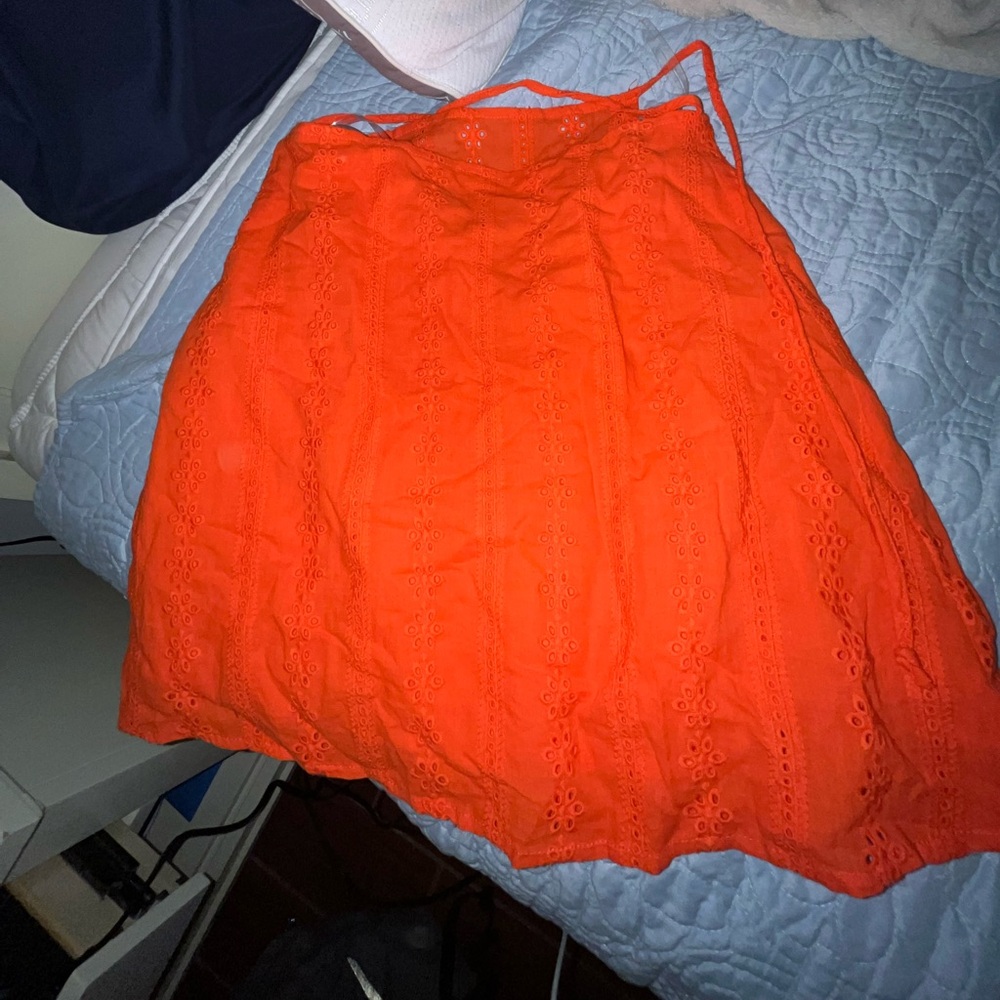 Never worn Francesca’s orange embroidered skirt